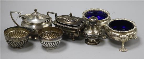 A pair of George III silver cauldron salts, a silver mustard (cover a.f.), another mustard, a pair of fluted salts and a pepper, 12.7oz